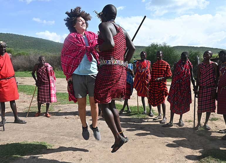 guests-jumping-with-maasai-in-maasai-village a visit to masai village