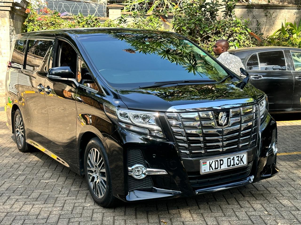 Airport transfer Nairobi driver meeting passenger at JKIA arrival terminal
